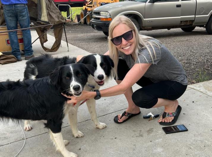 This is a photo of DeAnn Syverson with dogs